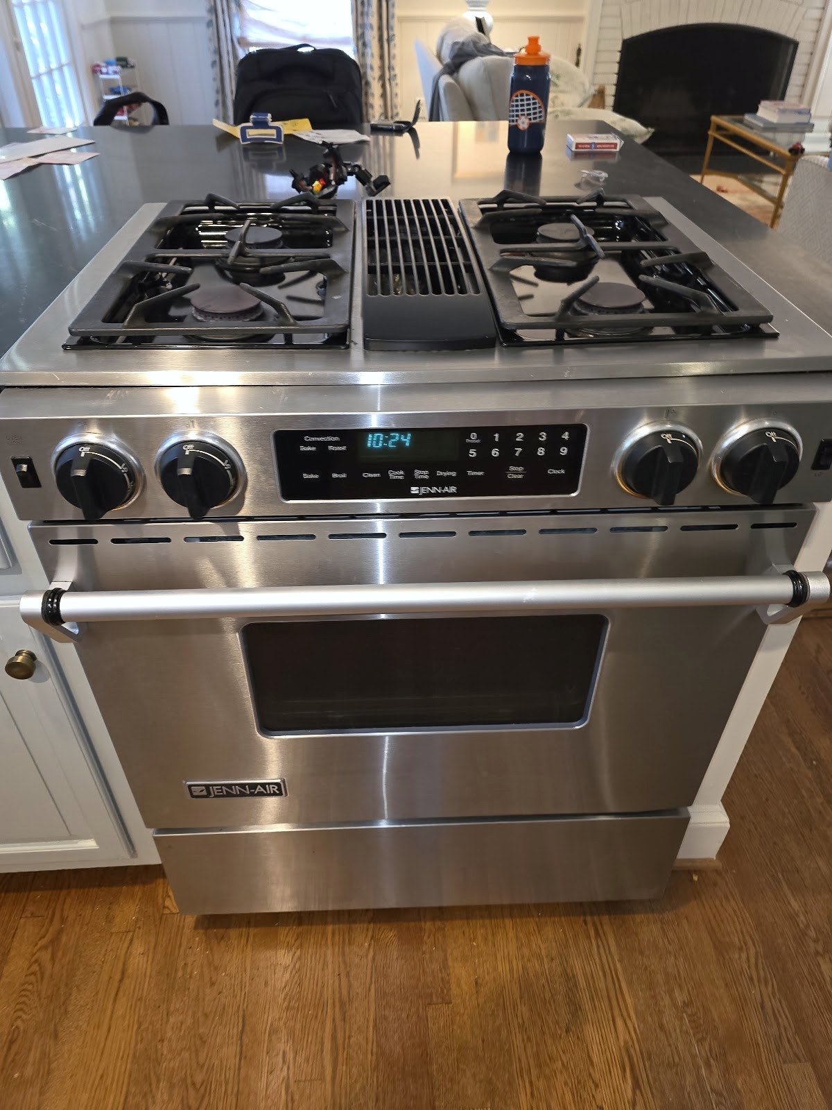 Stainless steel gas range with front controls and two oven doors
